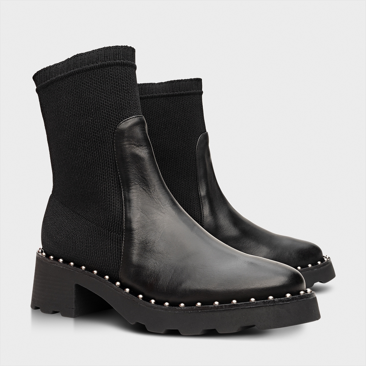 Bota chelsea best sale com salto